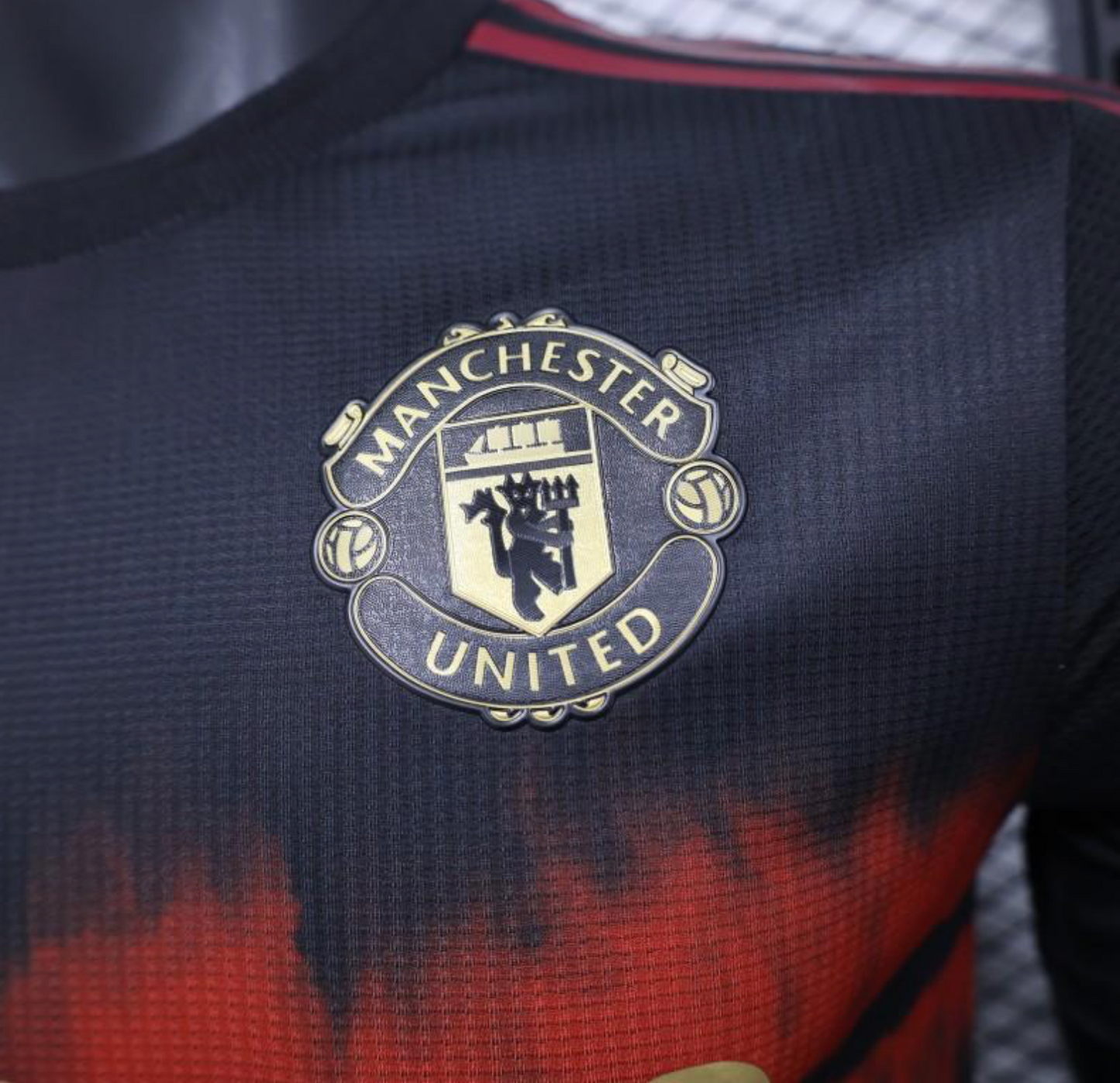 24/25 Manchester United Black/Red Pre-Match Jersey